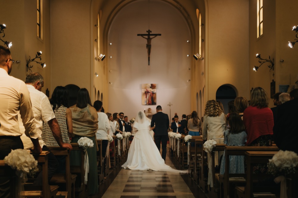 The church aisle as the bride walks in