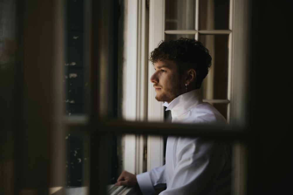 The groom looking out of the window