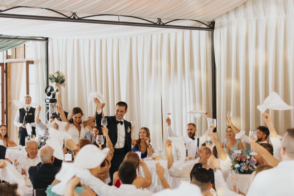 Guests waving their napkins